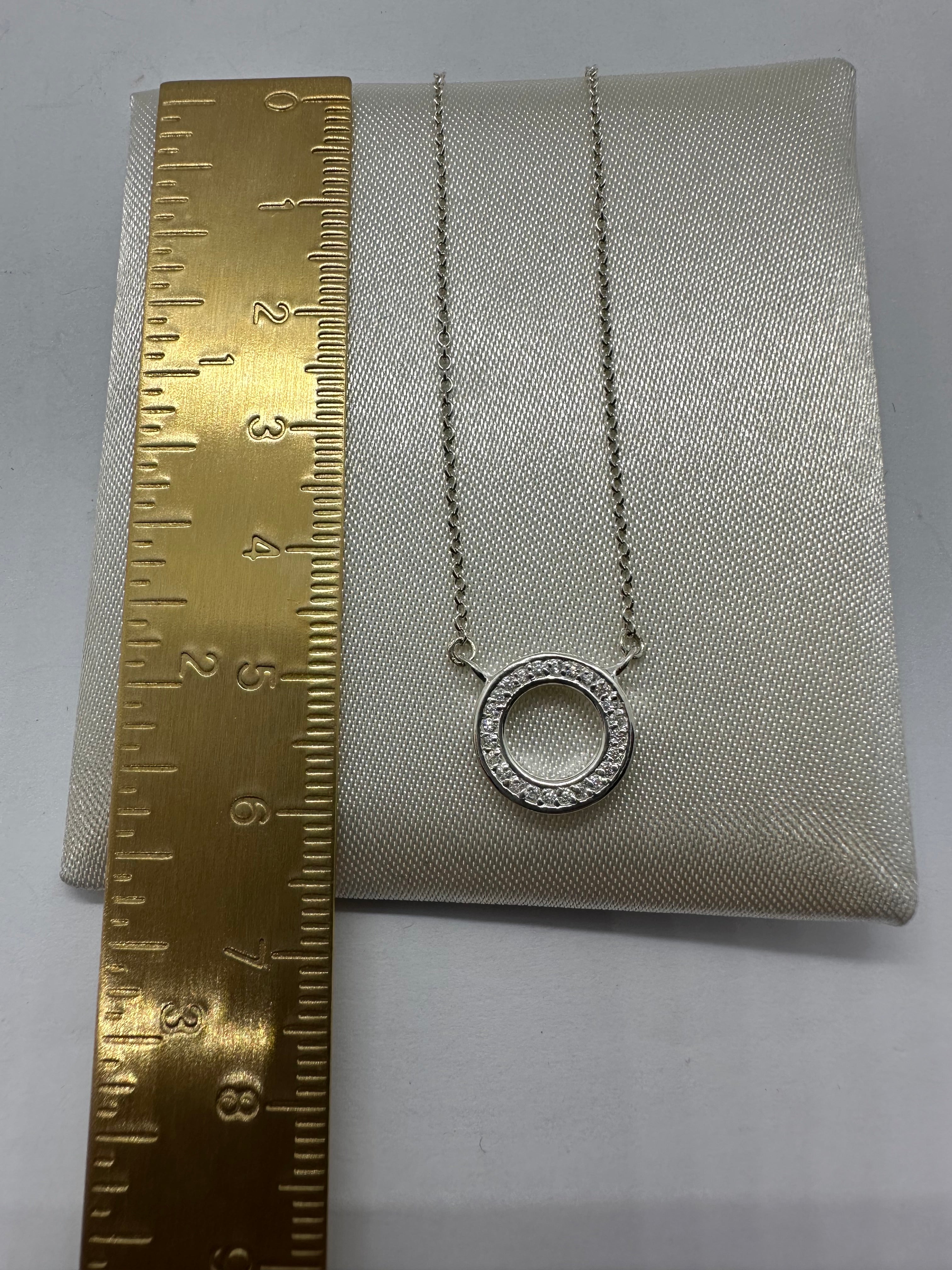 Silver and Cubic Zirconia circle pendant