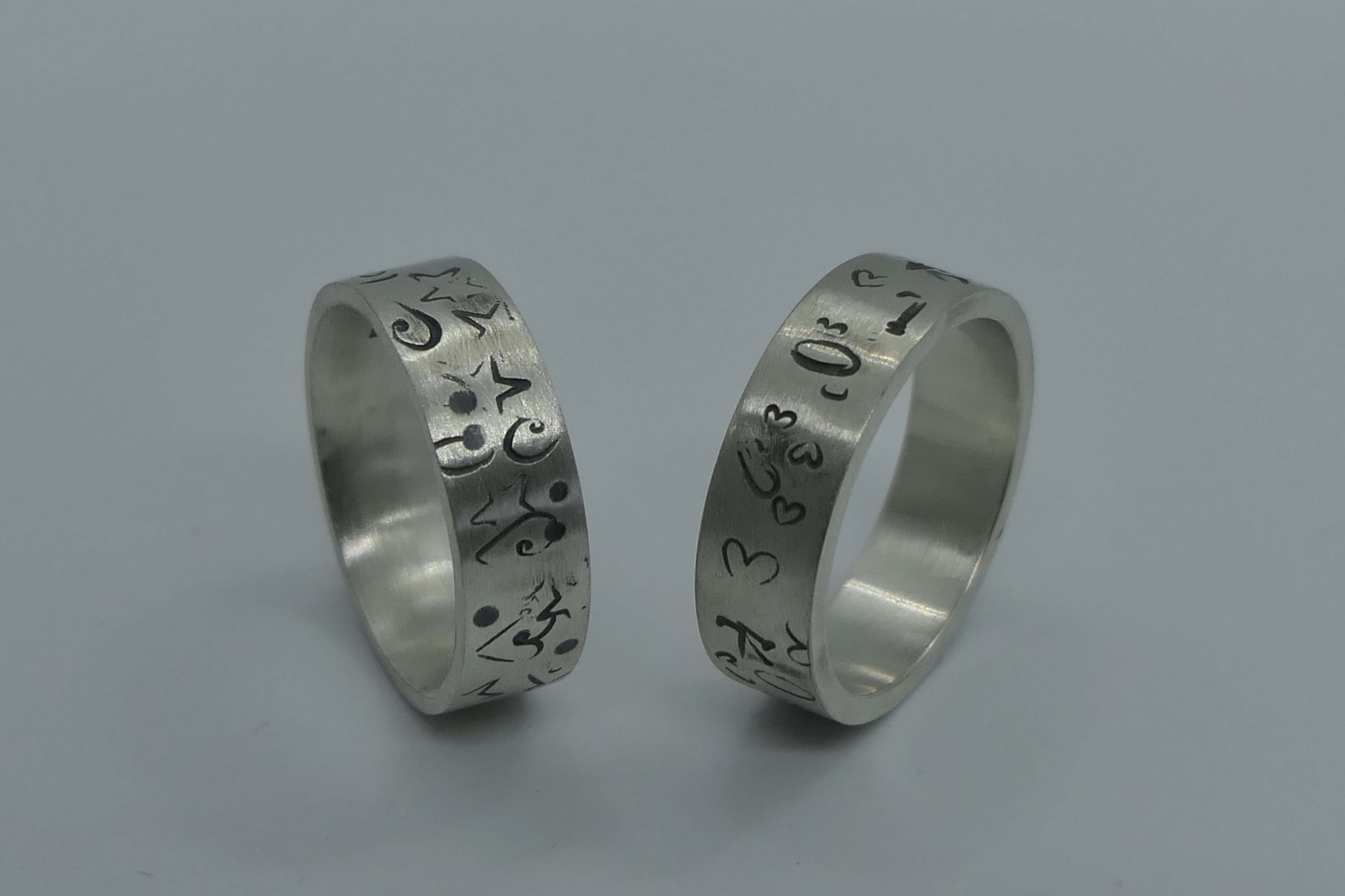 silver graffiti rings