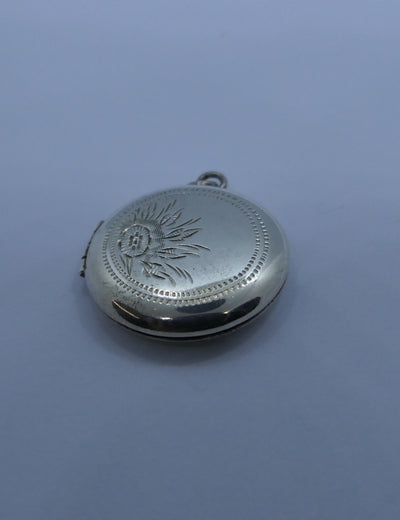 Silver vintage round locket