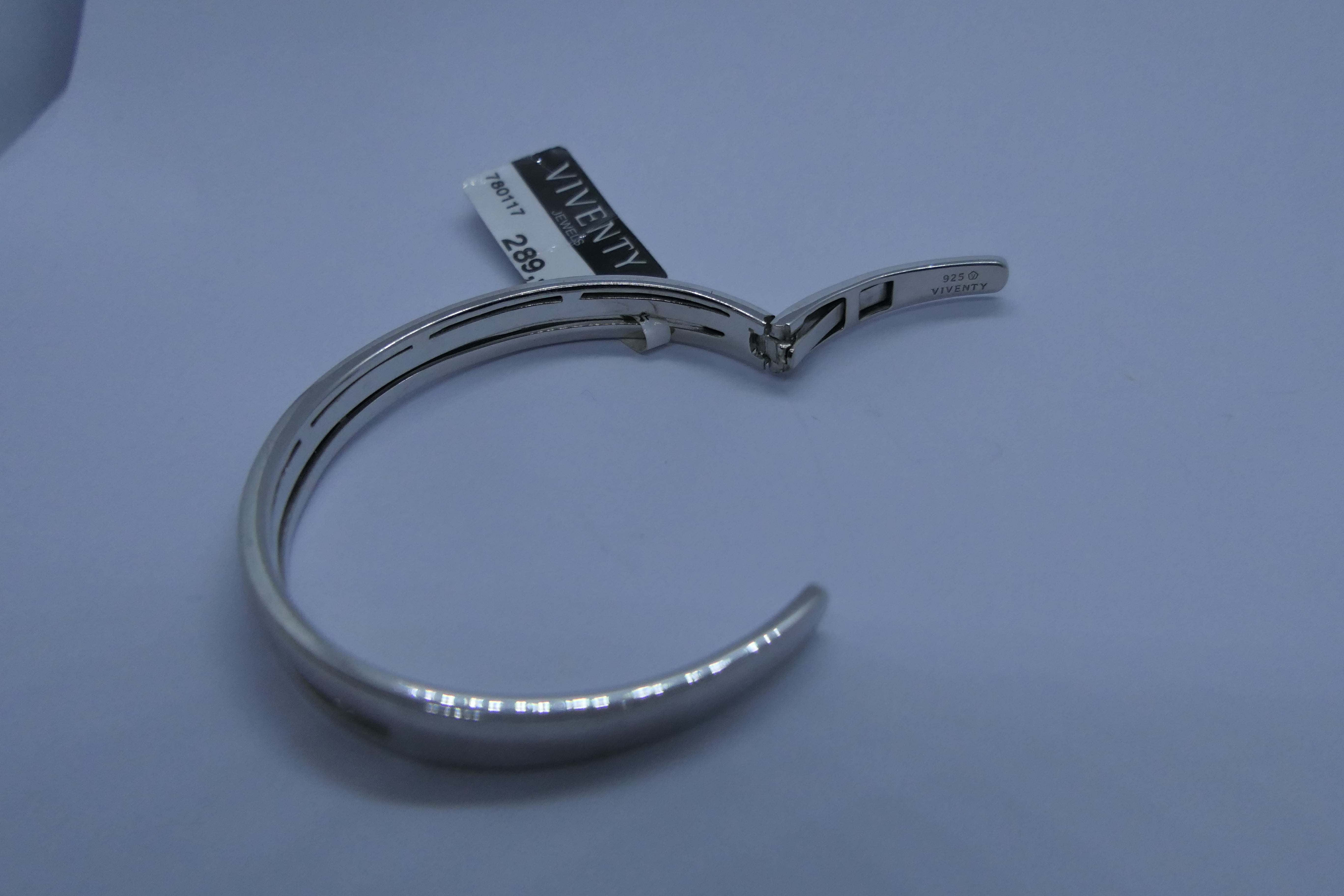 Silver and Cubic zirconia  hinged toque bangle