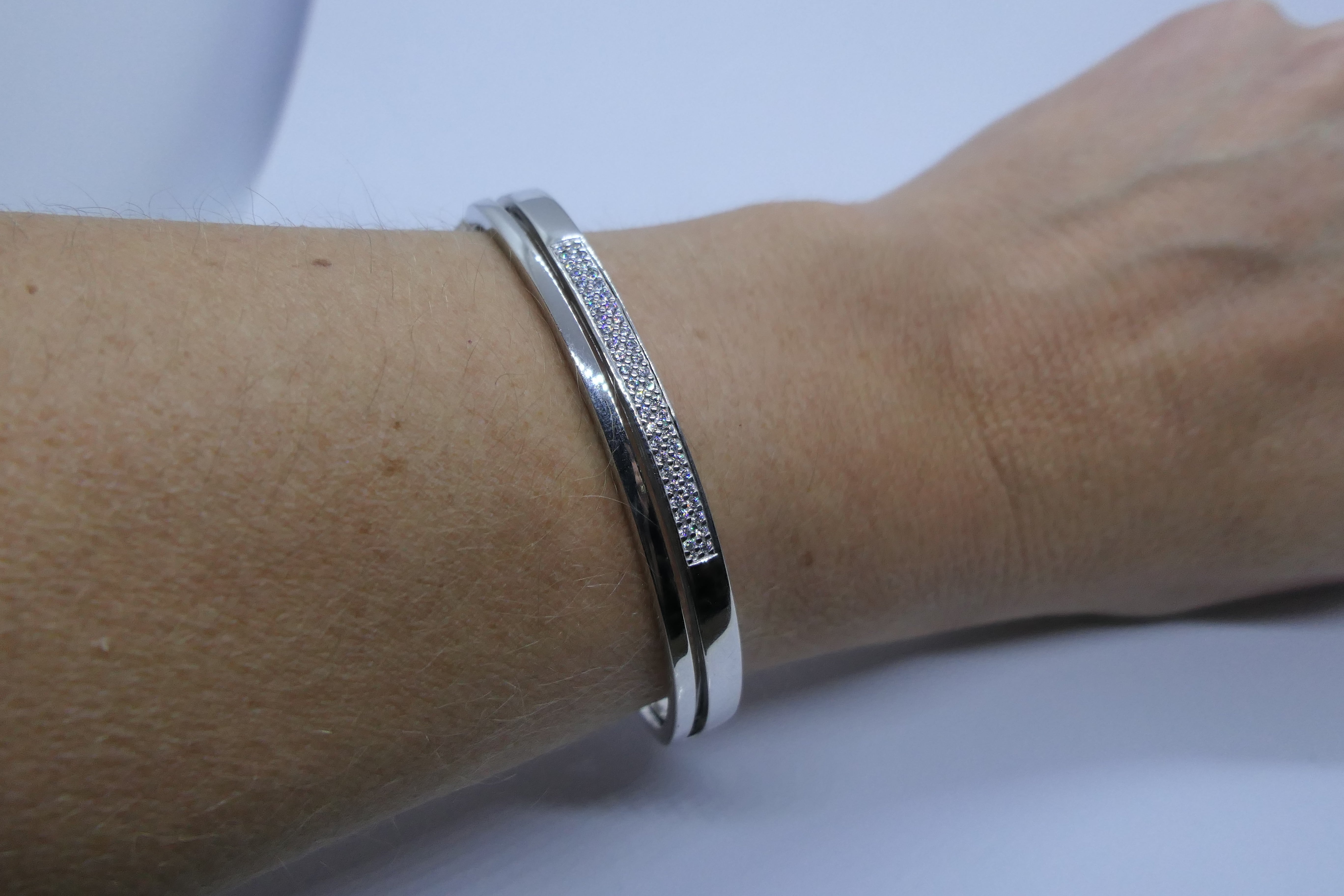 Silver and Cubic zirconia  hinged toque bangle