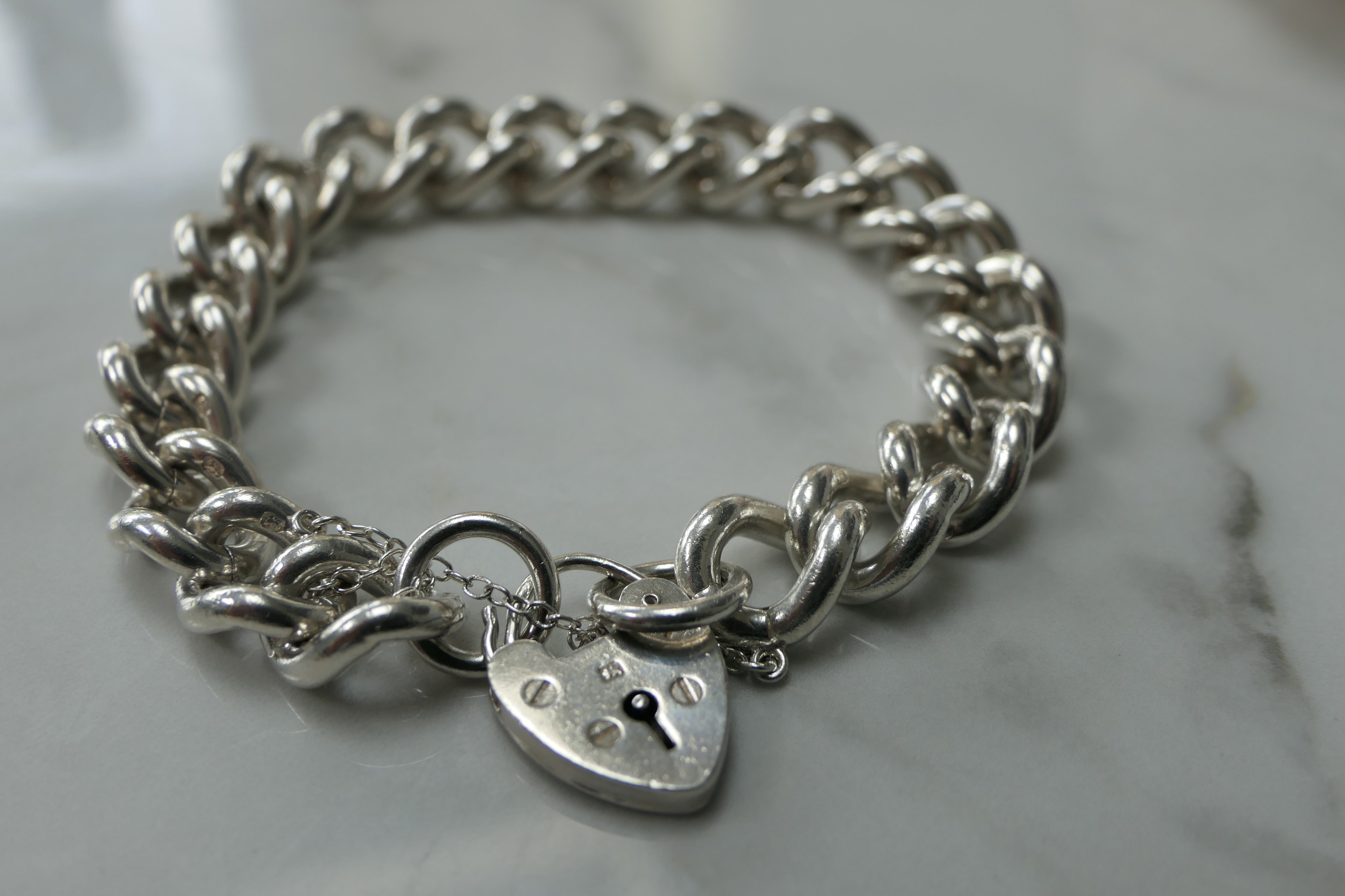 Silver curb charm bracelet