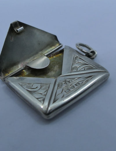 Silver stamp pendant