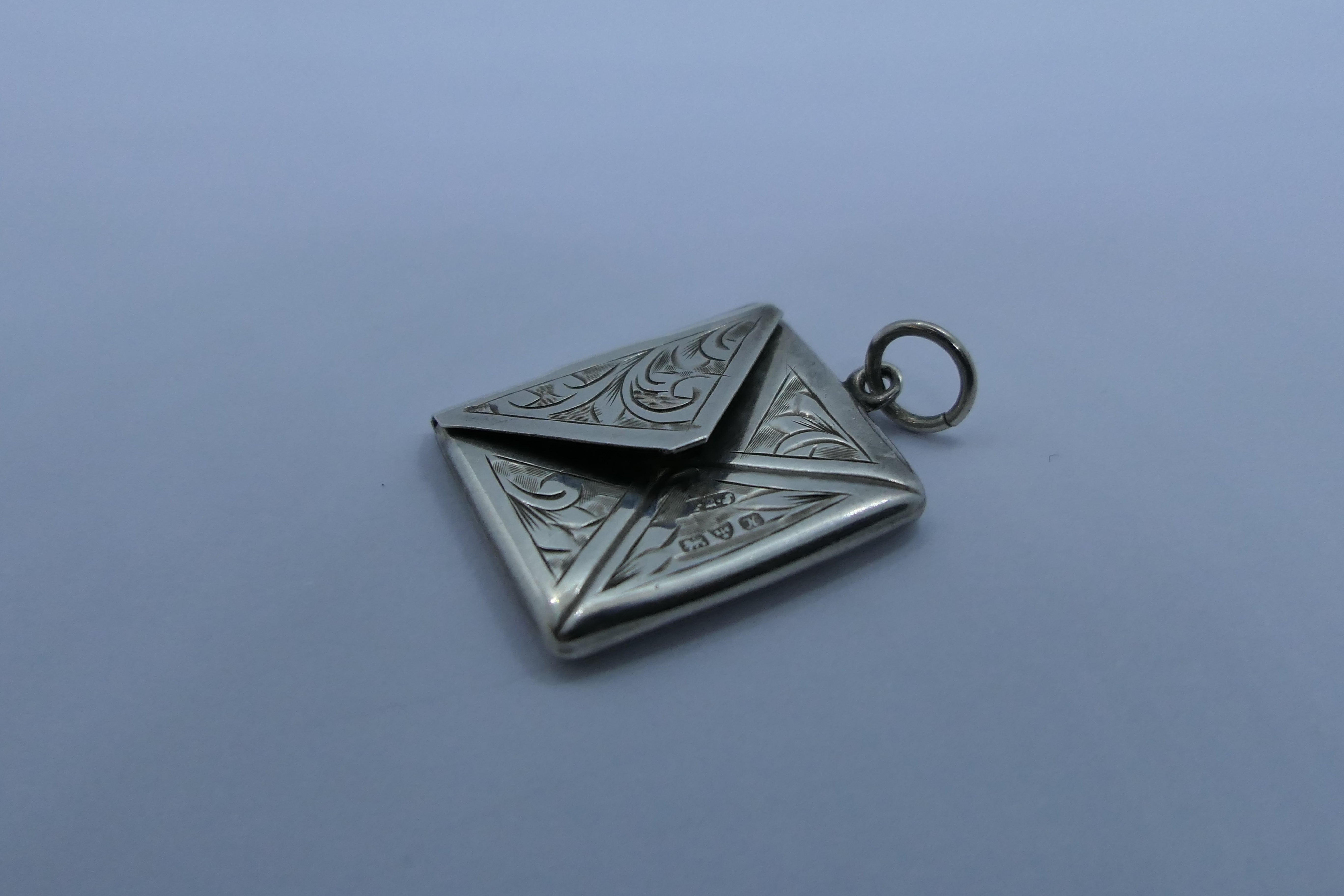 Silver stamp pendant